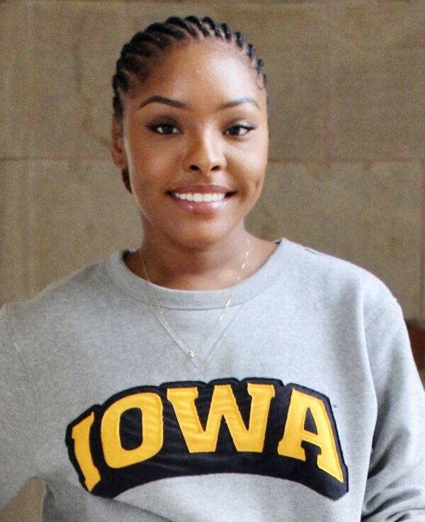 headshot of Kuann Fawkes in an IOWA sweatshirt