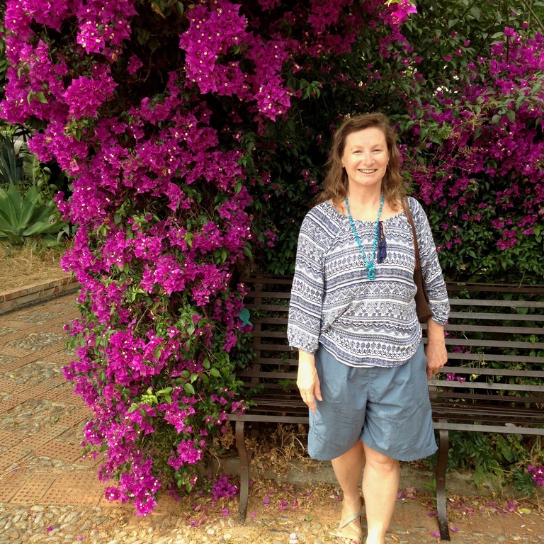 photo of Waltraud Maierhofer and bougainvillea
